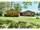 Charming brick ranch home featuring a well-maintained lawn and welcoming curb appeal at 5979 E Oak Hl Dr, Plainfield, IN 46168