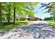 Charming brick home with a spacious front yard and a long driveway at 5979 E Oak Hl Dr, Plainfield, IN 46168