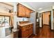 Efficient kitchen with stainless steel appliances and wood cabinets at 5979 E Oak Hl Dr, Plainfield, IN 46168