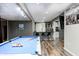 Basement entertainment area with pool table and bar, perfect for gatherings and relaxation at 6374 Timberbluff Cir, Avon, IN 46123