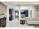 Open floor plan showcasing marble floors connecting the living room to the adjacent kitchen and dining areas at 6374 Timberbluff Cir, Avon, IN 46123