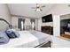 A main bedroom features vaulted ceilings, a ceiling fan, and an ensuite bathroom at 6374 Timberbluff Cir, Avon, IN 46123