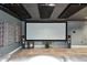 Finished basement theater room featuring a large screen, dark ceiling, and modern speaker system at 6374 Timberbluff Cir, Avon, IN 46123