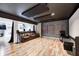 A finished basement theater room with surround sound, comfortable seating, and modern decor at 6374 Timberbluff Cir, Avon, IN 46123