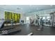Well-equipped fitness center with modern exercise machines, mirrored walls, and bright lighting for a healthy lifestyle at 6403 Yuma Ct, Whitestown, IN 46075