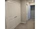 Hallway with carpet, white doors, and neutral walls at 6403 Yuma Ct, Whitestown, IN 46075