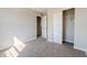 Bedroom with closet, carpet, and neutral paint at 6491 Enclave Blvd, Greenwood, IN 46143