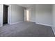 Bedroom with closet, carpet, and neutral paint at 6491 Enclave Blvd, Greenwood, IN 46143