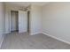 Bedroom with carpeted floor and walls painted in neutral colors, and a closet at 6491 Enclave Blvd, Greenwood, IN 46143