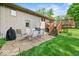 Charming backyard featuring a patio and deck area with a dining table and chairs at 665 Spring Hills Dr, Zionsville, IN 46077