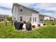 Well-maintained backyard with a patio, a black fence, and a lush green lawn area at 6683 School Branch Dr, Brownsburg, IN 46112