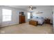 Large bedroom offering plenty of natural light and featuring classic wooden furniture at 6683 School Branch Dr, Brownsburg, IN 46112