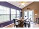 Dining area with natural light from large windows, with views of the backyard at 6683 School Branch Dr, Brownsburg, IN 46112