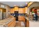 Kitchen area with ample cabinet space, granite countertops, and stainless steel appliances at 6683 School Branch Dr, Brownsburg, IN 46112