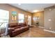 Living room with ample natural light, a comfortable couch, and stylish decor at 6683 School Branch Dr, Brownsburg, IN 46112