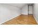 Bedroom with hardwood flooring, fresh paint, and white trim at 6839 Chaucer Ct, Indianapolis, IN 46220