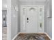 Elegant front door with decorative glass accents, creating a welcoming entrance at 6839 Chaucer Ct, Indianapolis, IN 46220