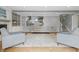 Spacious living room showcasing hardwood floors, fireplace, and built-in shelving at 6839 Chaucer Ct, Indianapolis, IN 46220