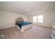 Bright main bedroom showcasing a decorative headboard, comfortable bedding and lots of space at 7234 Darley Ln, Indianapolis, IN 46259