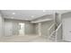Finished basement with carpet, neutral walls, and stairs to the upper level at 7372 Fox Hollow Rdg, Zionsville, IN 46077