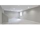 Expansive finished basement featuring neutral walls, recessed lighting and stairway at 7372 Fox Hollow Rdg, Zionsville, IN 46077