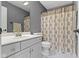 Bathroom features include vanity, mirror, toilet, and shower with curtain at 7372 Fox Hollow Rdg, Zionsville, IN 46077