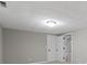 Bedroom with neutral paint, carpet and trim, along with a spacious closet at 7372 Fox Hollow Rdg, Zionsville, IN 46077