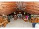 Spacious attic featuring a fireplace and cozy sitting area perfect for relaxing at 7730 Bear Creek Rd, Morgantown, IN 46160