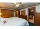 Bedroom with hardwood features a closet, private bathroom and a view into the bedroom at 7730 Bear Creek Rd, Morgantown, IN 46160