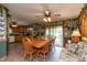 Cozy dining area blending into the kitchen with table, seating, and natural light at 7730 Bear Creek Rd, Morgantown, IN 46160