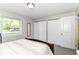 Bedroom with natural light, carpet, and a full sized bed at 7771 Delbrook Dr, Indianapolis, IN 46260