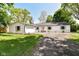 Charming single-story home with a well-manicured lawn and classic curb appeal at 7771 Delbrook Dr, Indianapolis, IN 46260