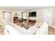 Cozy living room showcasing a sectional sofa, stylish coffee table, and elegant decor at 7771 Delbrook Dr, Indianapolis, IN 46260
