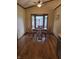 Bright dining room with hardwood floors and a bay window at 8055 Foxchase Dr, Indianapolis, IN 46256
