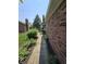 Brick exterior and landscaping showing a walkway to the front of the property at 8055 Foxchase Dr, Indianapolis, IN 46256