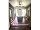 Spacious bathroom features a tub with custom tile flooring and a ceiling fan at 866 Fletcher Ave, Indianapolis, IN 46203
