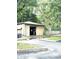 Detached garage with a neutral exterior and large opening at 866 Fletcher Ave, Indianapolis, IN 46203