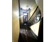 Entry hallway featuring original hardwood floors and a staircase at 866 Fletcher Ave, Indianapolis, IN 46203
