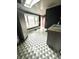This kitchen features modern flooring, ample sunlight, and updated cabinets at 866 Fletcher Ave, Indianapolis, IN 46203