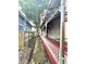 A long, covered porch with detailed railings runs alongside this classic home at 866 Fletcher Ave, Indianapolis, IN 46203