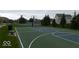 Community basketball court with court lines and a hoop, great for recreation and sports at 902 Racetime Rd, Westfield, IN 46074