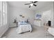 Cozy bedroom with a ceiling fan, neutral decor, and a comfortable bed at 902 Racetime Rd, Westfield, IN 46074