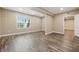 Bright bedroom with hardwood flooring, natural light, and neutral paint at 902 Racetime Rd, Westfield, IN 46074