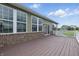 Large deck features sliding glass doors and white railings at 902 Racetime Rd, Westfield, IN 46074
