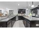 Well-equipped kitchen featuring granite counters, stainless steel appliances, and ample cabinet space at 902 Racetime Rd, Westfield, IN 46074