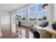 Bright living area with hardwood floors, natural light, and stylish modern furnishings at 902 Racetime Rd, Westfield, IN 46074