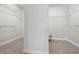 A spacious walk-in closet with carpet flooring and wire shelving at 902 Racetime Rd, Westfield, IN 46074