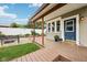 Charming backyard with a deck, small yard, and curb appeal at 910 E Pike St, Martinsville, IN 46151