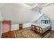 Charming bedroom featuring one bed, hardwood floors, and a cozy atmosphere at 910 E Pike St, Martinsville, IN 46151