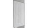 A paneled bi-fold closet door with white painted finish at 9134 Jene Ct, Indianapolis, IN 46234
